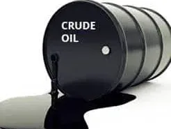 Crude oil spilling from a black drum